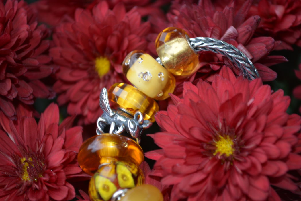 Honey colored glass Trollbeads with Bumblebee Spacer on a Silver Trollbeads Foxtail Chain