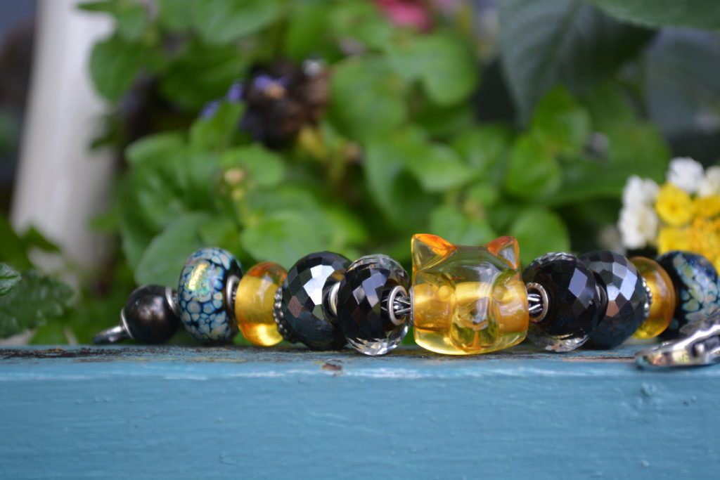 Trollbeads Carved Amber Giant Cat Face on Bracelet | Trollbeadsakron.com